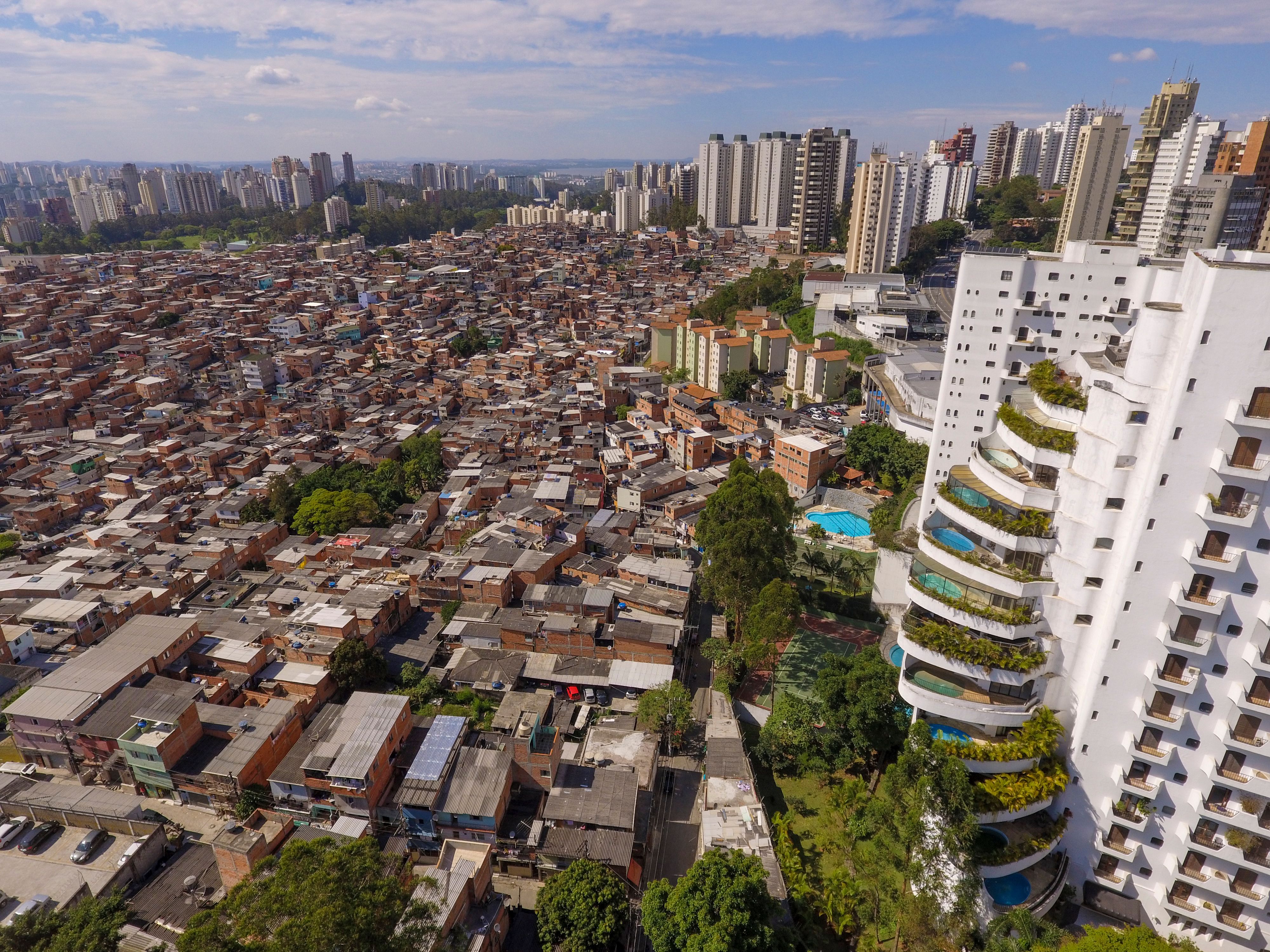 The Paraisópolis slum, the largest in the city of São Paulo, is located next to Morumbi, a wealthy neighborhood with high-end residential buildings.
